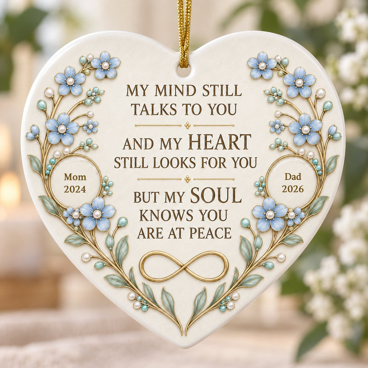 Heart ceramic ornament with light blue forget-me-not flowers, gold vines, and a gold infinity symbol memorial design.