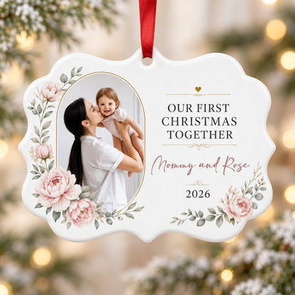 White scalloped ceramic ornament with gold oval photo frame, pink peonies, and Our First Christmas Together text.
