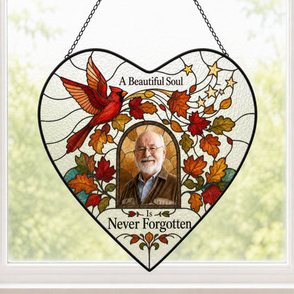Heart stained glass suncatcher with flying red cardinal, autumn leaves, gold stars, and a central photo frame.