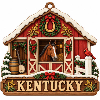 Snow-topped red barn ornament with brown horse, horseshoe wreath, wheat, and “KENTUCKY” text on a barn silhouette.