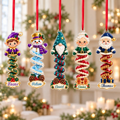 Clear acrylic ornament with a cartoon elf or Mrs. Claus, spiral ribbon body, holly, and a white name scroll.