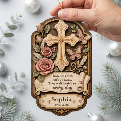 Ornate arch wood ornament with carved cross, roses, butterflies and memorial quote with name and dates.