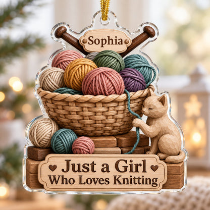 Acrylic ornament shaped around a yarn basket, cat and needles with 'Just a Girl Who Loves Knitting' and a name banner.