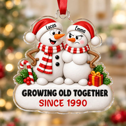 Custom-cut acrylic ornament of a snowman couple with candy cane, gift box, and Growing Old Together text on a snowy base