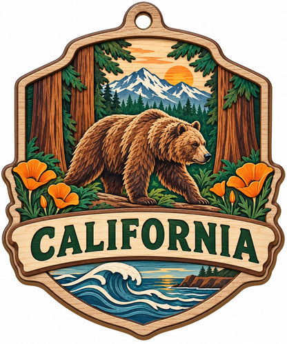 Shield-shaped wood ornament reading CALIFORNIA with bear on log, poppies, redwoods, mountains, and ocean waves.