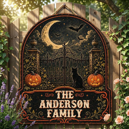 Arched wooden sign with crescent moon, bats, wrought-iron gate, black cat and jack-o'-lanterns with family name.