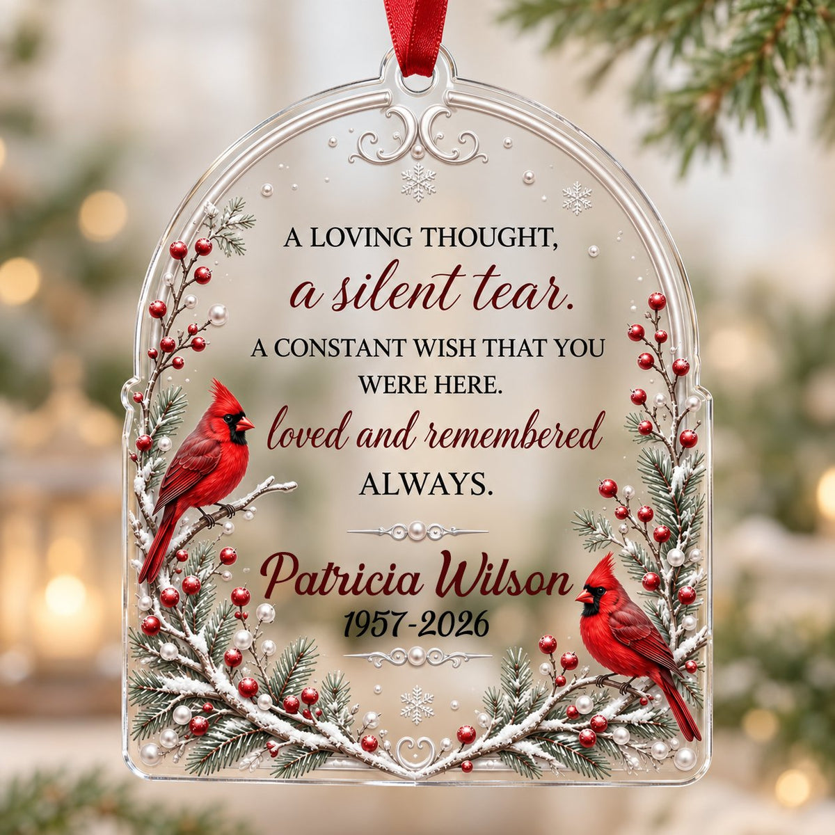 Clear acrylic arch ornament with two red cardinals, snowy evergreens, memorial verse, plus personalized name and dates.