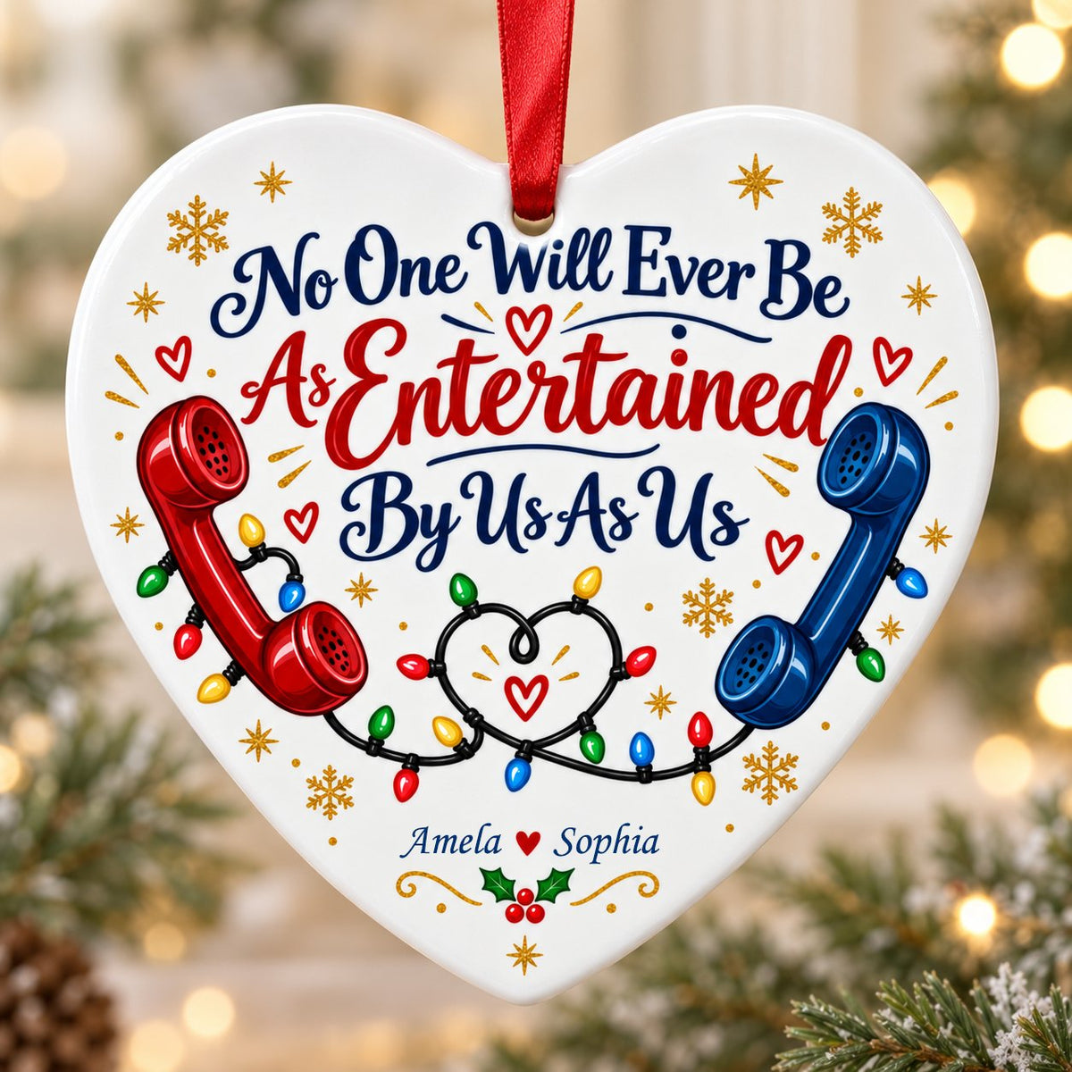 Heart ceramic ornament with red and blue vintage phones, heart-shaped Christmas lights, gold snowflakes and holly.