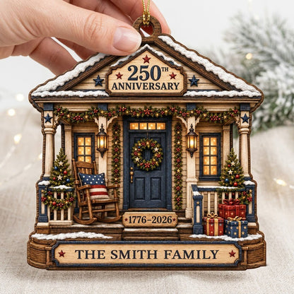 House-shaped ornament with patriotic porch, blue door, wreath, and '250TH ANNIVERSARY 1776-2026' text