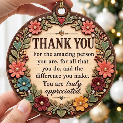 Round wood ornament with carved-look floral border and THANK YOU appreciation message in the center.