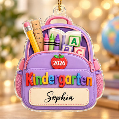 Purple backpack acrylic ornament with ABC blocks, apple, Kindergarten text, 2026 year, and a stitched name banner.