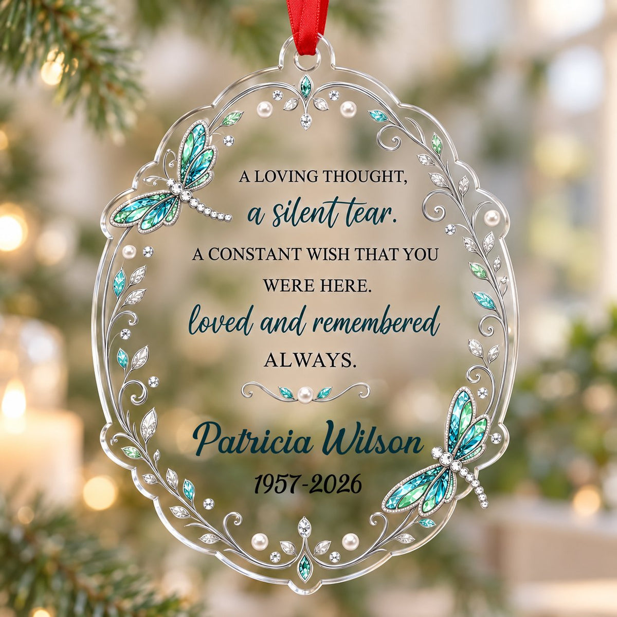 Clear acrylic ornament with teal and blue dragonflies, silver filigree, and a memorial quote with name and dates.