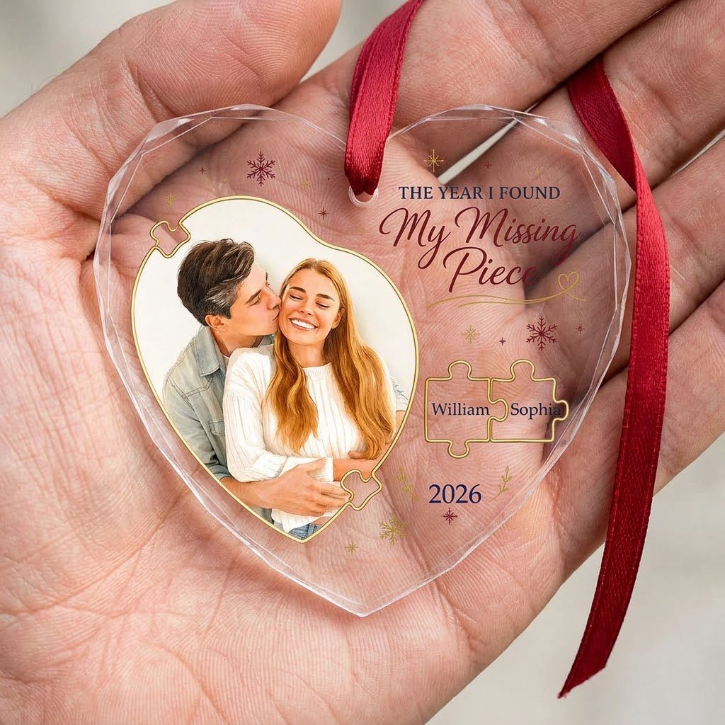 Heart glass ornament with gold puzzle pieces, couple photo, snowflakes, reading THE YEAR I FOUND My Missing Piece.