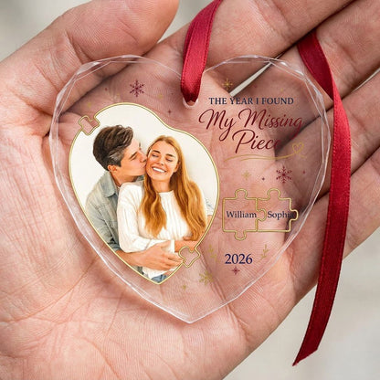 Heart glass ornament with gold puzzle pieces, couple photo, snowflakes, reading THE YEAR I FOUND My Missing Piece.