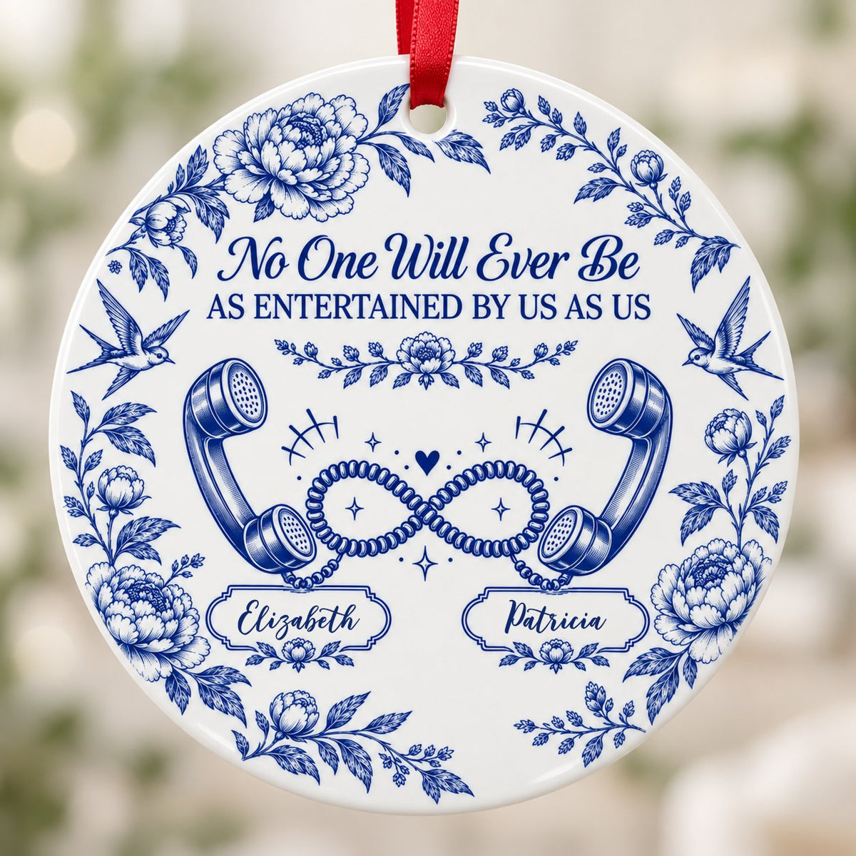 Blue toile round ornament with crown, swallows, vintage phones in an infinity and two name banners
