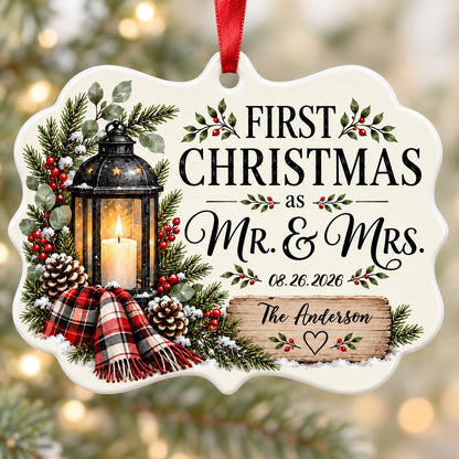 Medallion ceramic ornament with black lantern, pine, red berries, plaid scarf, and 'FIRST CHRISTMAS as MR. & MRS.' text.