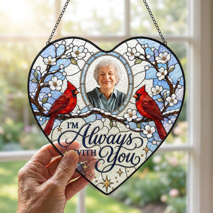 Heart suncatcher with two red cardinals on snowy branches, round photo window, and the words I'M Always WITH You.