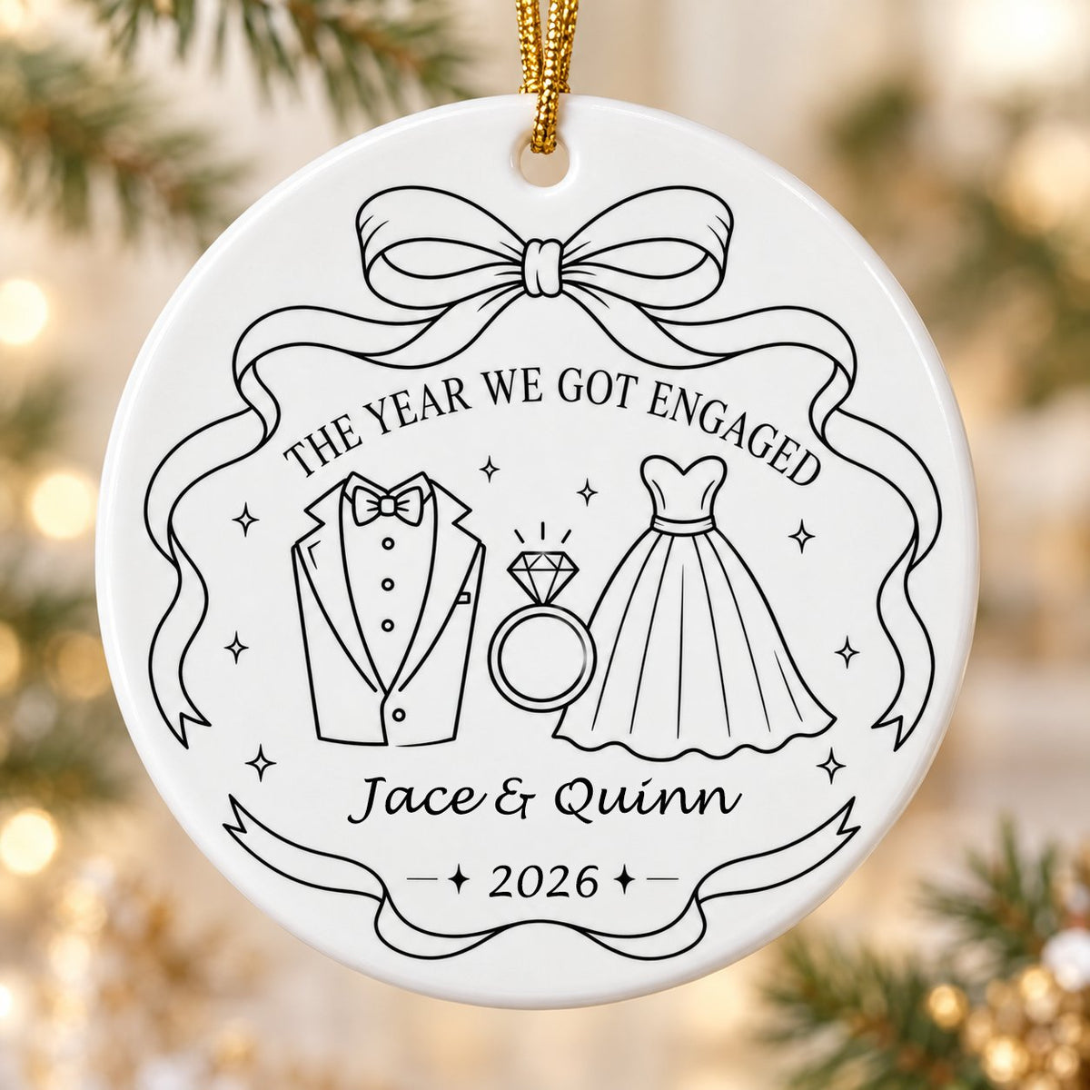 Round white ceramic ornament with black line art of bow, tuxedo, ring, dress, and THE YEAR WE GOT ENGAGED banner.