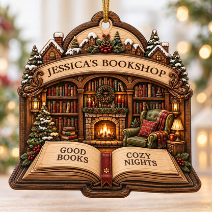 Custom-cut wood ornament with arched loop and open book base, cozy bookshop scene with tree, fireplace, armchair.