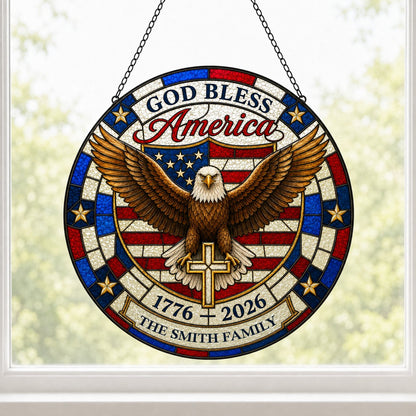 Round stained glass-look suncatcher with a bald eagle over a gold cross and an American flag shield with family name.