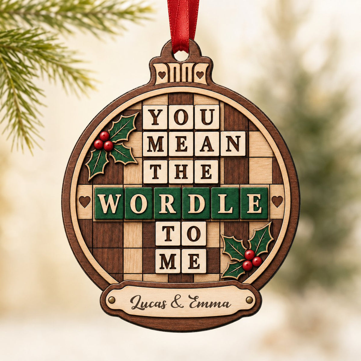 Bauble wood ornament with 'You Mean The Wordle To Me', green WORDLE tiles, holly and personalized names