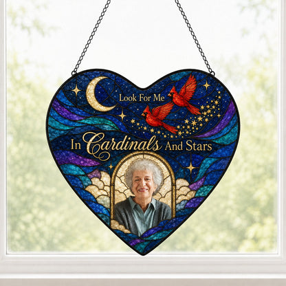 Heart-shaped stained glass suncatcher with night sky, moon, stars, two red cardinals, and a golden photo frame.