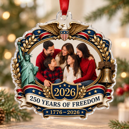 Ornate scalloped acrylic ornament with eagle, Statue of Liberty, Liberty Bell and an oval family photo frame.