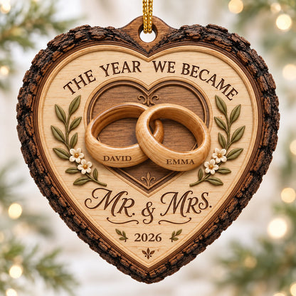 Heart-shaped wood ornament with bark edge, wedding rings, leafy vines, and 'THE YEAR WE BECAME MR. & MRS.' text.