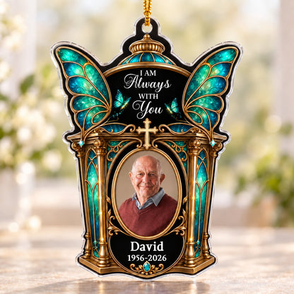 Clear acrylic ornament with winged shrine, teal butterfly wings, cross, oval photo, and 'I AM Always WITH You'.