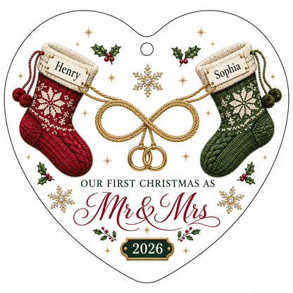 Heart glass ornament with red and green knit stockings, gold infinity loop with rings, Mr & Mrs text, names and date.