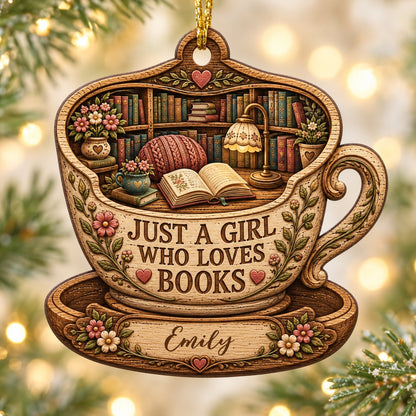 Teacup-shaped wood ornament with cozy library scene and 'JUST A GIRL WHO LOVES BOOKS' plus a personalized name.