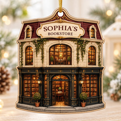 Custom-cut ornament shaped like a vintage bookstore with green and gold storefront and 'BOOKSTORE' text personalized abo