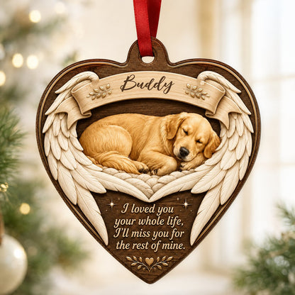 Heart-shaped wood ornament with a sleeping golden retriever, angel wings, ribbon banner, stars, and a memorial quote.