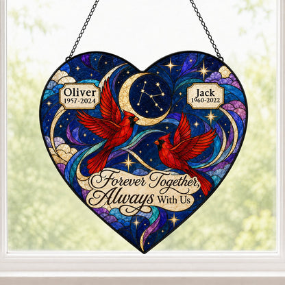 Heart stained glass suncatcher with two red cardinals, crescent moon, stars, clouds, and memorial name banners.