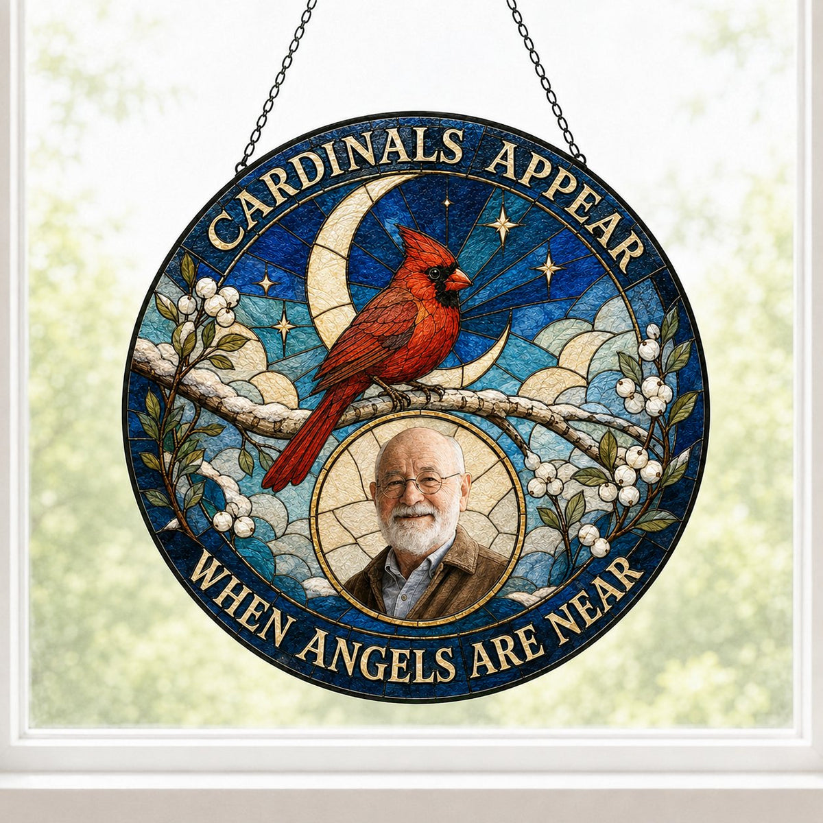 Round stained-glass style suncatcher with a red cardinal, starry blue sky, crescent moon, and a circular frame with a pe