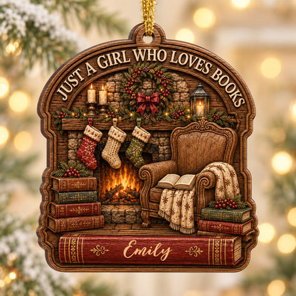 Wood ornament with fireplace, wreath, stockings, armchair and books, plus 'Just a Girl Who Loves Books' and a name.