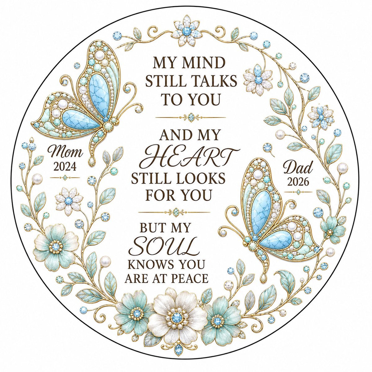 White round ornament with jeweled butterflies, floral wreath, and memorial quote with personalized name and year.