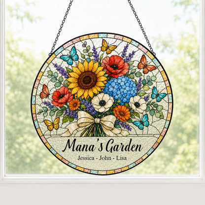 Round stained-glass style suncatcher with floral bouquet, butterflies, and 'Mana's Garden' with names.