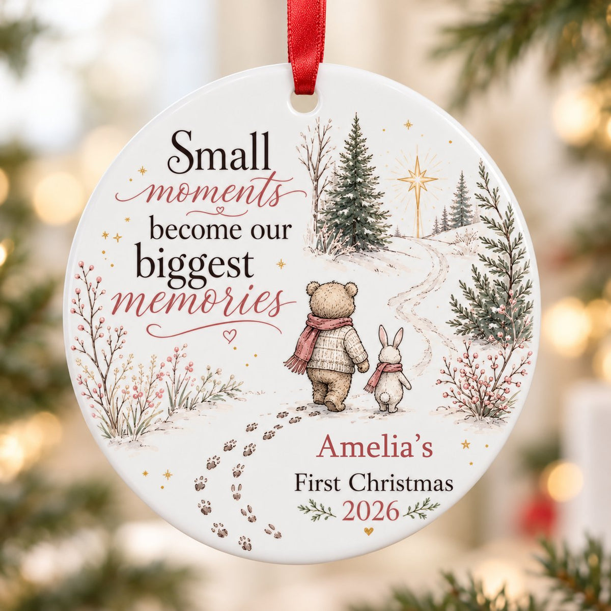 Round ceramic ornament with bear and bunny in scarves on snowy path, trees, star, quote, and personalized name and year.