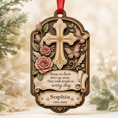 Ornate arch wood ornament with carved cross, roses, butterflies and memorial quote with name and dates.