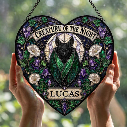 Heart stained glass suncatcher with a black bat over a moon, ivy, white morning glory flowers, purple bellflowers, and c