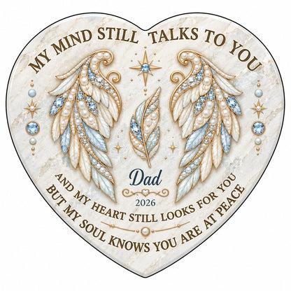 White heart ceramic ornament with jeweled angel wings, blue gems, gold scrollwork, personalized name and year.