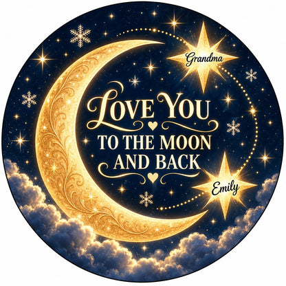 Round ceramic ornament with golden crescent moon, navy sky, stars, and 'LOVE YOU TO THE MOON AND BACK'.